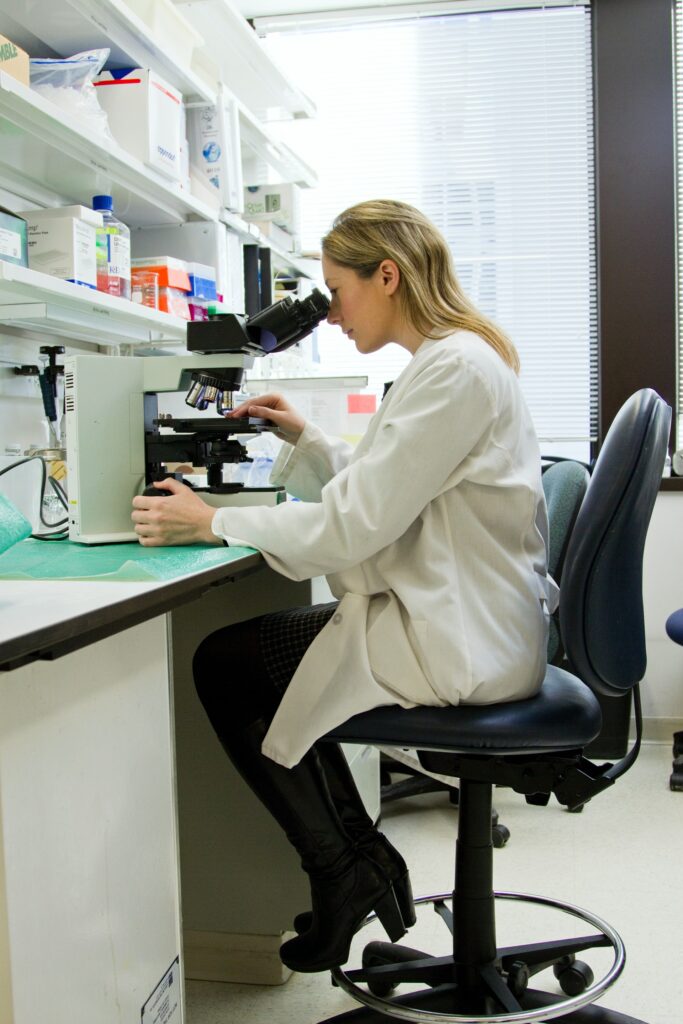 Woman using a microscope