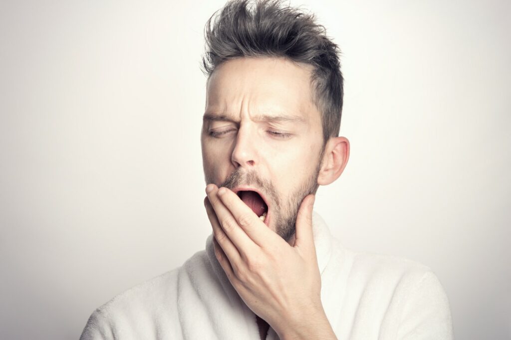 A man yawning.