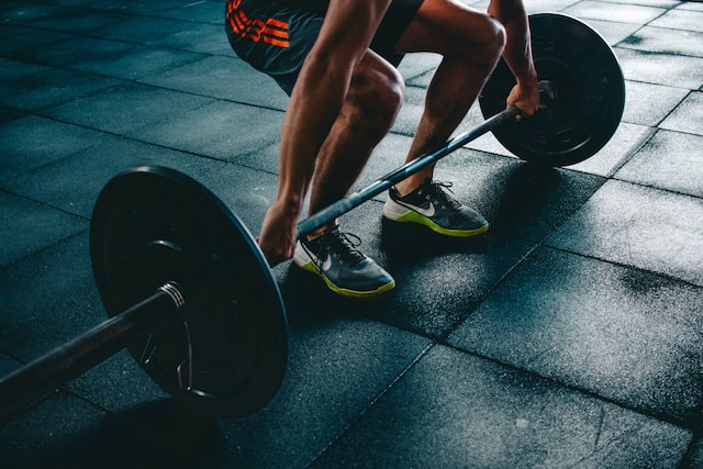 Man attempting to lift some weights